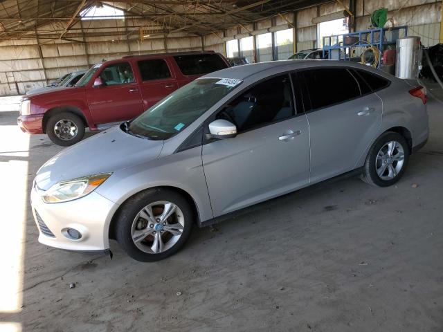 FORD FOCUS SE 2013 with VIN 1FADP3F24DL211042 - Photo from auction