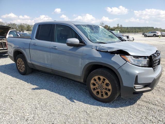 Photo 4 from auction – 2023 HONDA RIDGELINE with VIN 5FPYK3F52PB065274