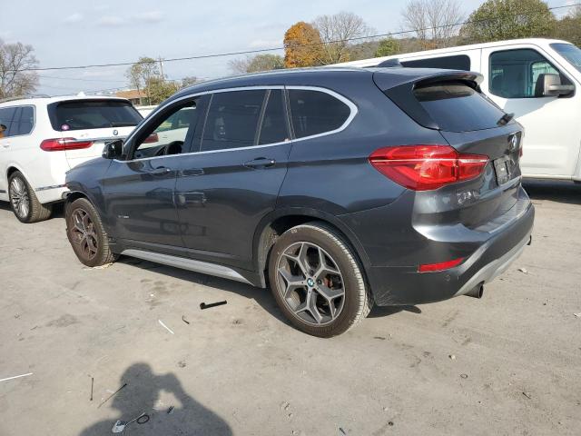 Photo 2 from auction – 2016 BMW X1 XDRIVE2 with VIN WBXHT3C35G5F65770