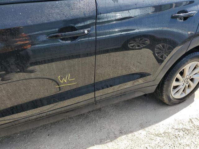 Photo 13 from auction – 2017 HYUNDAI TUCSON SE with VIN KM8J23A47HU570367