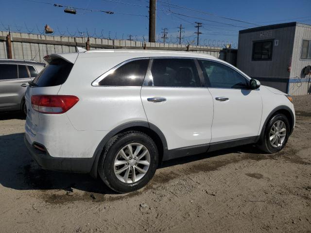Photo 3 from auction – 2016 KIA SORENTO LX with VIN 5XYPG4A52GG043335