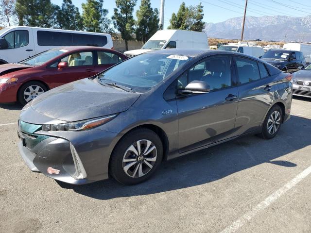 TOYOTA PRIUS PRIM 2018 with VIN JTDKARFP2J3099371 - Photo from auction
