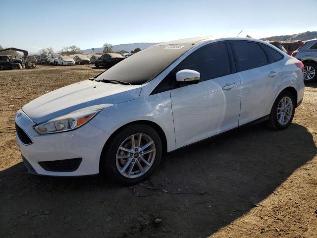 FORD FOCUS SE 2017 with VIN 1FADP3F25HL267674 - Photo from auction
