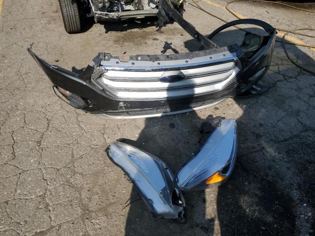 Photo 13 from auction – 2017 FORD ESCAPE SE with VIN 1FMCU0GD2HUD39563