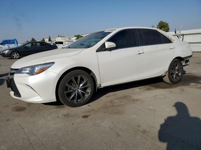 TOYOTA CAMRY LE 2015 with VIN 4T1BF1FKXFU874925 - Photo from auction