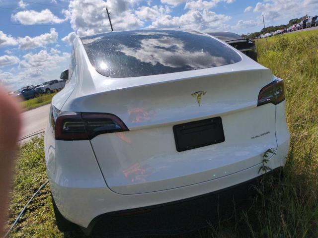 Photo 6 from auction – 2023 TESLA MODEL Y with VIN 7SAYGDEE4PA047098