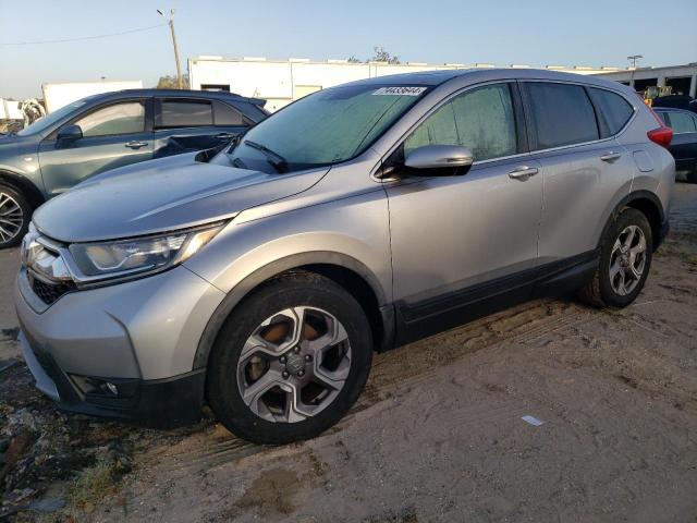 HONDA CR-V EX 2018 with VIN 7FARW1H57JE017185 - Photo from auction