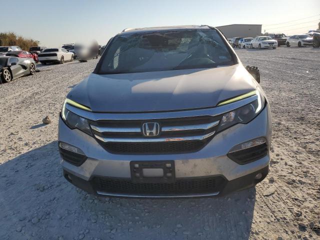 Photo 5 from auction – 2016 HONDA PILOT TOUR with VIN 5FNYF5H99GB057536