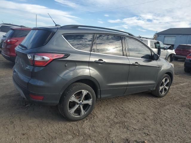 Photo 3 from auction – 2017 FORD ESCAPE SE with VIN 1FMCU9GD2HUC16074