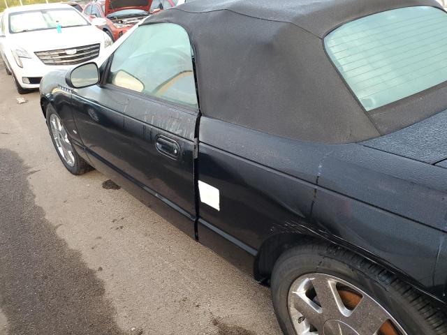 Photo 12 from auction – 2003 FORD THUNDERBIR with VIN 1FAHP60A13Y112604