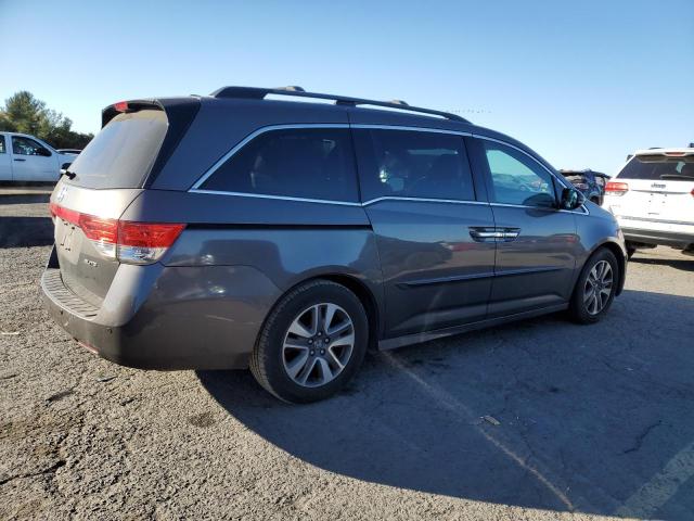 Photo 3 from auction – 2015 HONDA ODYSSEY TO with VIN 5FNRL5H94FB034693