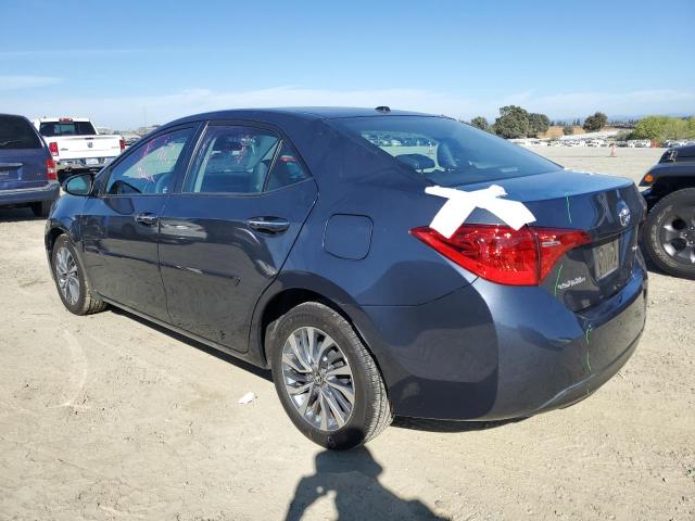 Photo 2 from auction – 2017 TOYOTA COROLLA L with VIN 5YFBURHE9HP571795