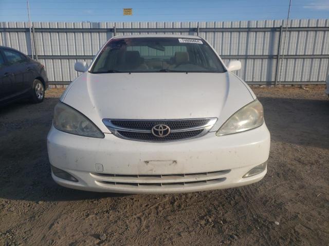 Photo 5 from auction – 2004 TOYOTA CAMRY LE with VIN JTDBE30KX40266872