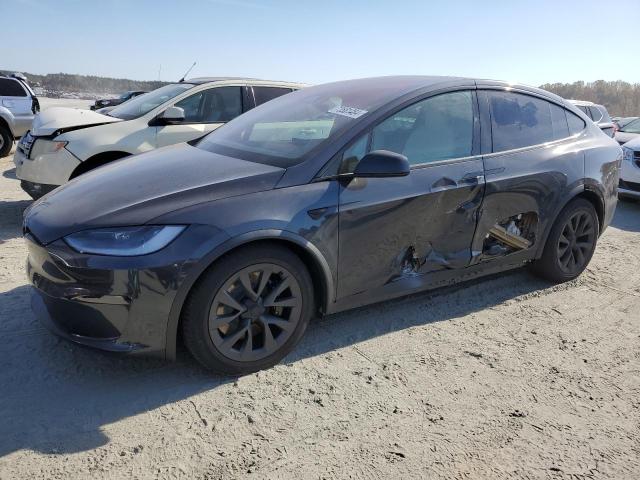TESLA MODEL X 2024 with VIN 7SAXCBE5XRF447328 - Photo from auction
