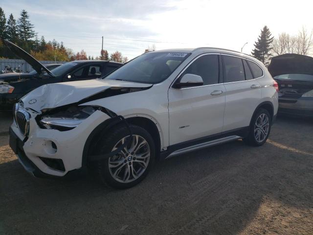 BMW X1 XDRIVE2 2017 with VIN WBXHT3C3XH5F75440 - Photo from auction