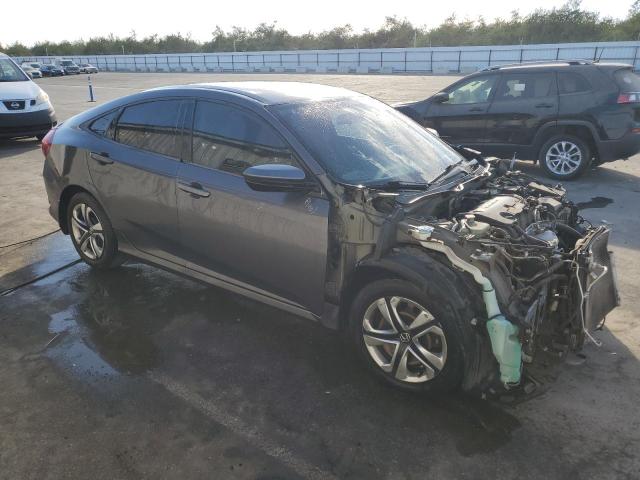 Photo 4 from auction – 2017 HONDA CIVIC LX with VIN 2HGFC2F53HH552357