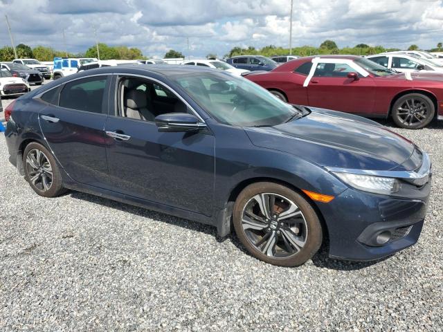 Photo 4 from auction – 2017 HONDA CIVIC TOUR with VIN 19XFC1F98HE014387