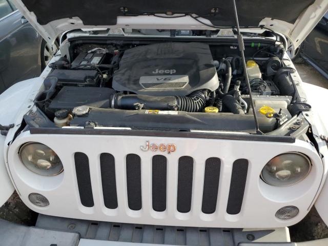 Photo 11 from auction – 2015 JEEP WRANGLER S with VIN 1C4AJWBG3FL581094