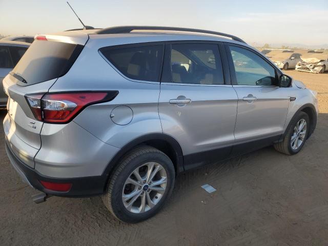 Photo 3 from auction – 2018 FORD ESCAPE SE with VIN 1FMCU9G92JUC65020