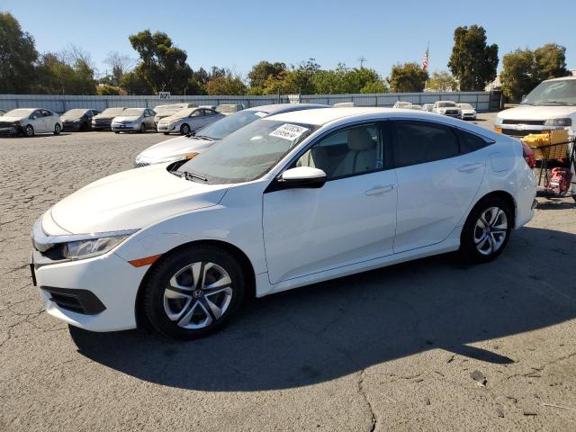 HONDA CIVIC LX 2017 with VIN 19XFC2F57HE223705 - Photo from auction