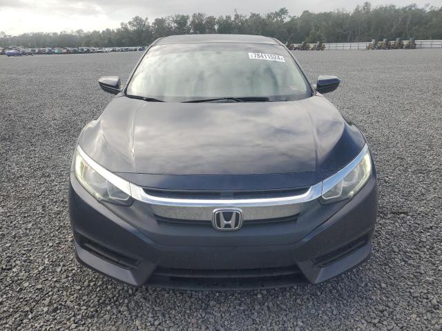 Photo 5 from auction – 2018 HONDA CIVIC LX with VIN 2HGFC2F59JH574112