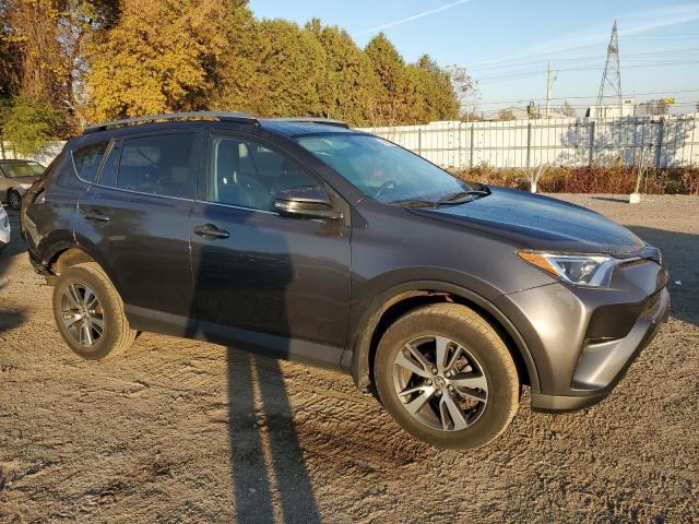 Photo 4 from auction – 2018 TOYOTA RAV4 LE with VIN 2T3ZFREV4JW499493