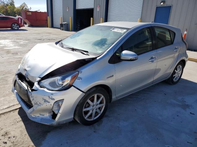 TOYOTA PRIUS C 2015 with VIN JTDKDTB39F1579384 - Photo from auction