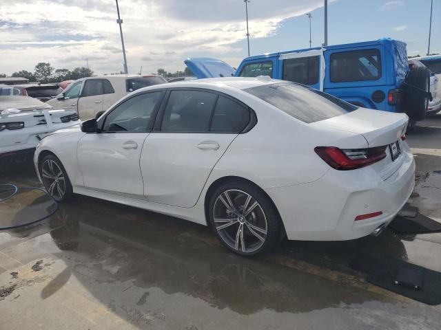 Photo 2 from auction – 2023 BMW 330I with VIN 3MW69FF07P8D41953