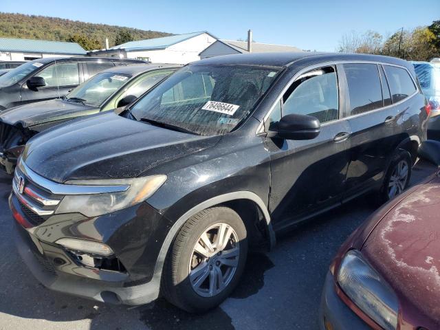 HONDA PILOT LX 2016 with VIN 5FNYF6H12GB080673 - Photo from auction
