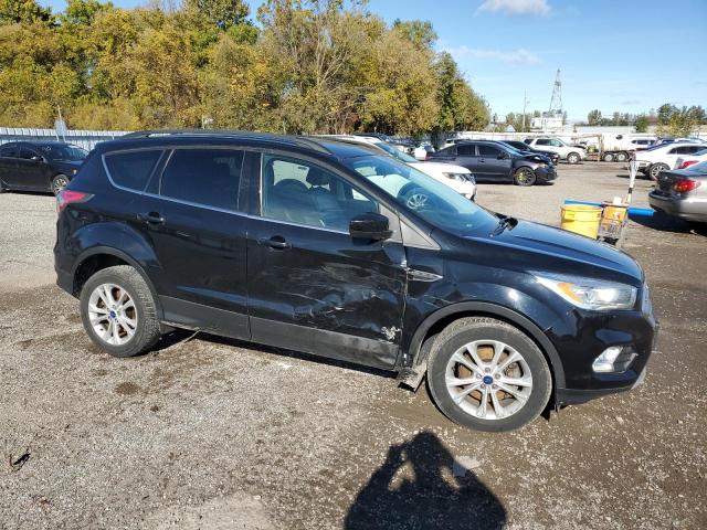 Photo 4 from auction – 2017 FORD ESCAPE SE with VIN 1FMCU0G98HUA55382