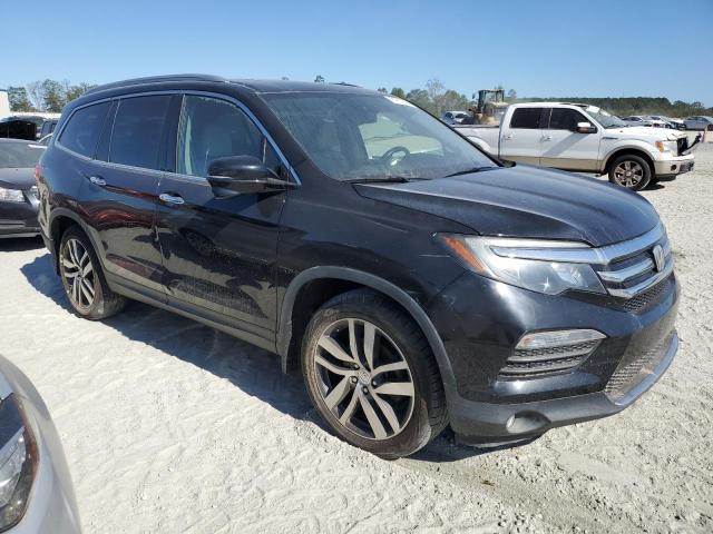 Photo 4 from auction – 2016 HONDA PILOT TOUR with VIN 5FNYF5H96GB049216
