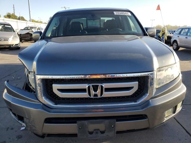 Photo 5 from auction – 2010 HONDA RIDGELINE with VIN 5FPYK1F5XAB002757