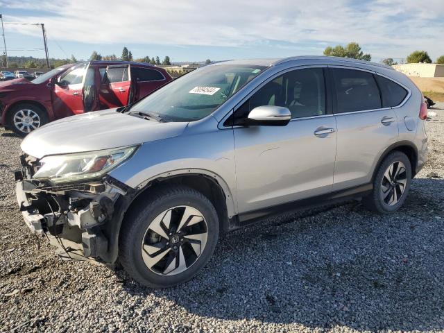 HONDA CR-V TOURI 2016 with VIN 5J6RM4H96GL064570 - Photo from auction