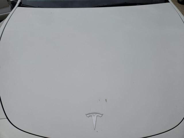 Photo 11 from auction – 2022 TESLA MODEL Y with VIN 7SAYGDEE9NF460196