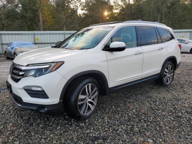 Photo 1 from auction – 2017 HONDA PILOT TOUR with VIN 5FNYF6H90HB105402