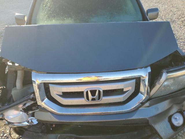 Photo 12 from auction – 2009 HONDA PILOT TOUR with VIN 5FNYF38909B025842
