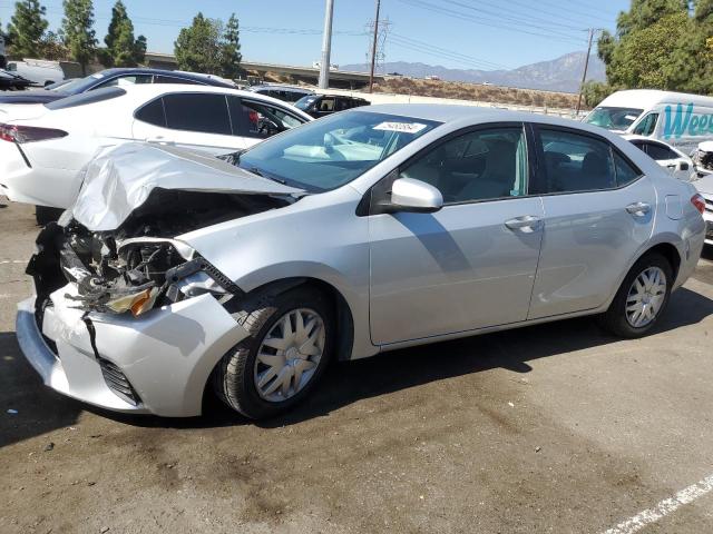 TOYOTA COROLLA L 2015 with VIN 5YFBURHE4FP270316 - Photo from auction