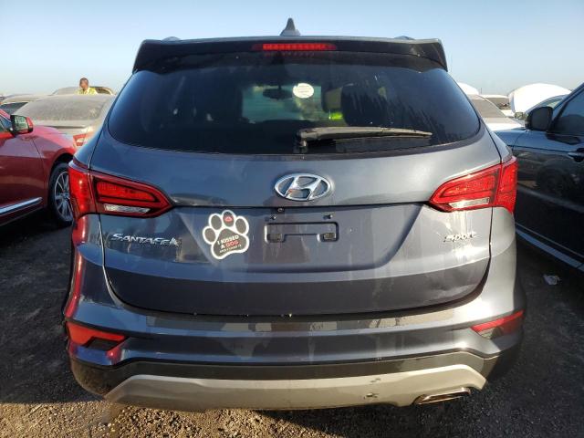 Photo 6 from auction – 2017 HYUNDAI SANTA FE S with VIN 5NMZU3LB5HH030391