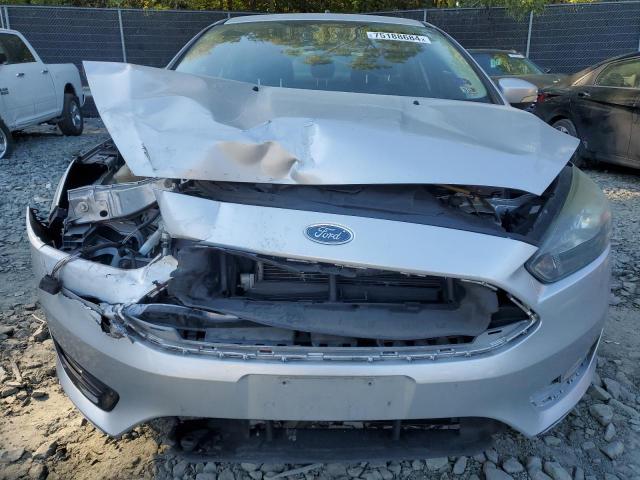 Photo 5 from auction – 2016 FORD FOCUS SE with VIN 1FADP3FE4GL257209