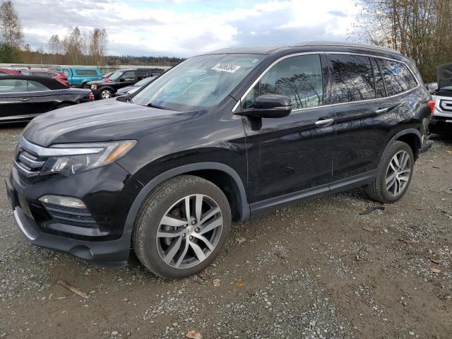 Photo 1 from auction – 2018 HONDA PILOT TOUR with VIN 5FNYF6H9XJB063603