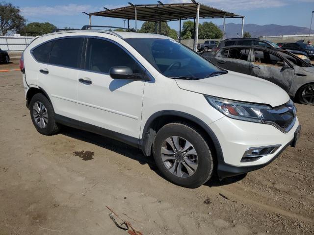 Photo 4 from auction – 2015 HONDA CR-V LX with VIN 5J6RM3H34FL001584