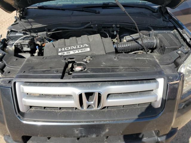Photo 12 from auction – 2006 HONDA PILOT EX with VIN 2HKYF185X6H548591