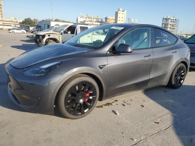 TESLA MODEL Y 2022 with VIN 7SAYGDEF9NF466251 - Photo from auction