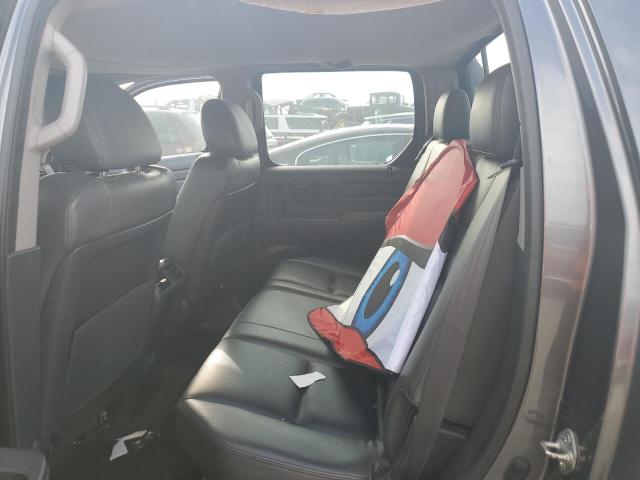 Photo 10 from auction – 2011 HONDA RIDGELINE with VIN 5FPYK1F20BB453199