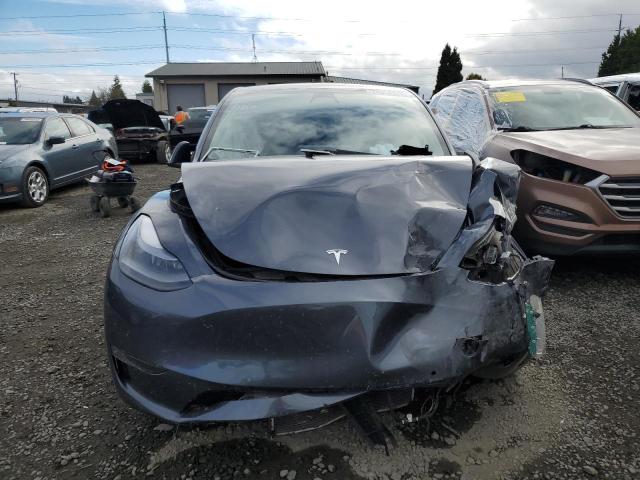Photo 5 from auction – 2022 TESLA MODEL Y with VIN 7SAYGDEF4NF489565