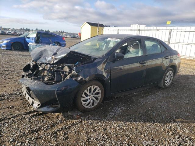 TOYOTA COROLLA L 2017 with VIN 5YFBURHE9HP680998 - Photo from auction