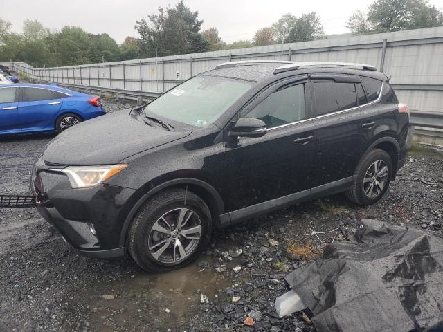 TOYOTA RAV4 ADVEN 2018 with VIN 2T3RFREV2JW758062 - Photo from auction