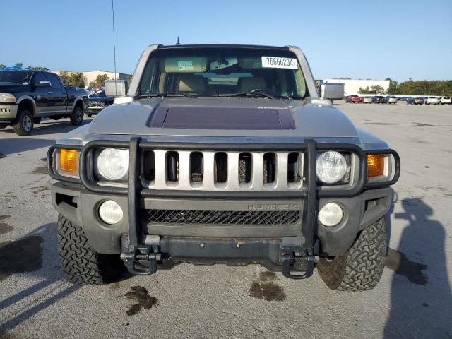 Photo 5 from auction – 2009 HUMMER H3 with VIN 5GTEN13E398111475