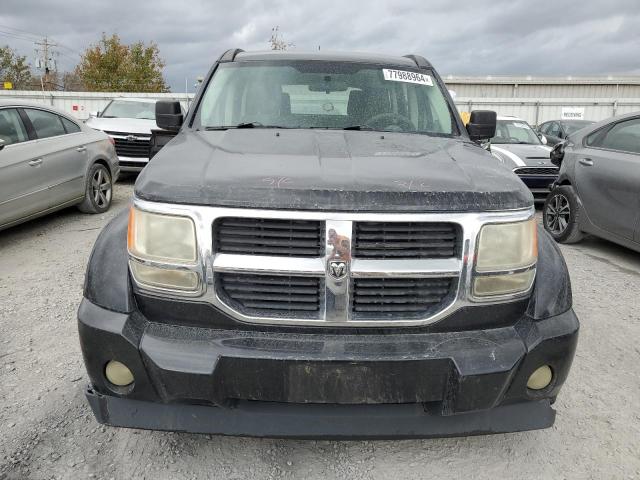 Photo 5 from auction – 2009 DODGE NITRO SE with VIN 1D8GU28K59W527001