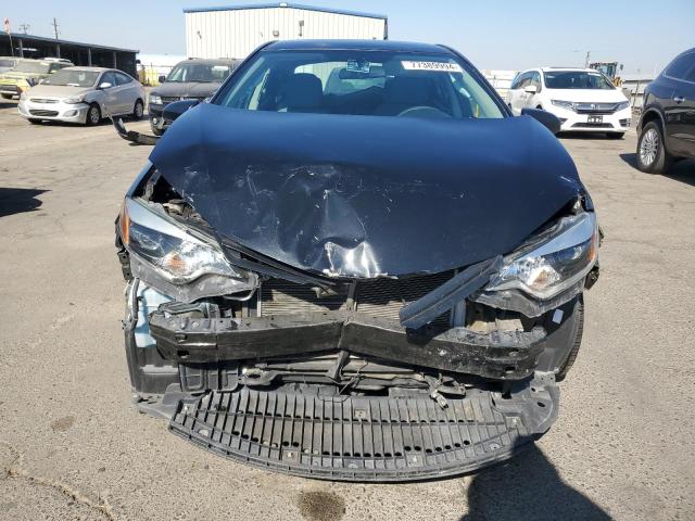 Photo 5 from auction – 2014 TOYOTA COROLLA L with VIN 5YFBURHE9EP107837